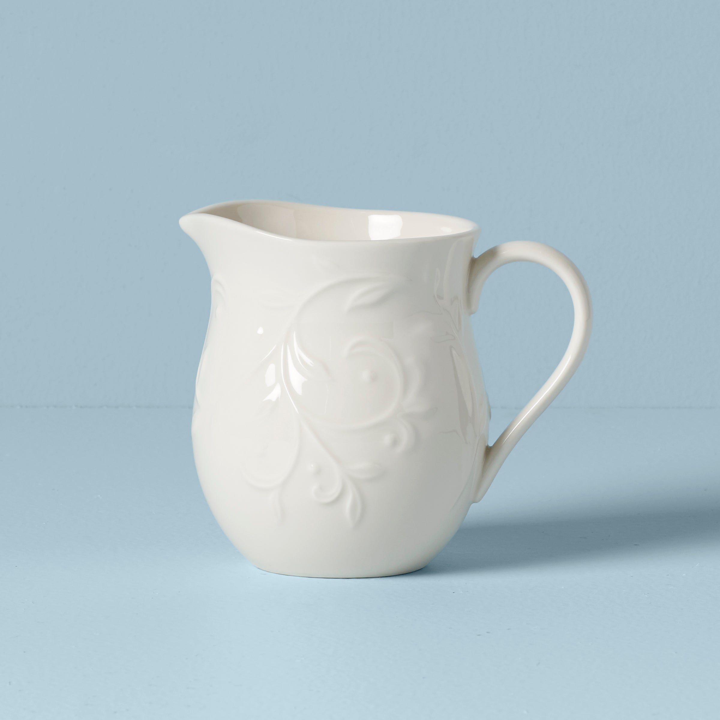 Opal Innocence Carved Creamer